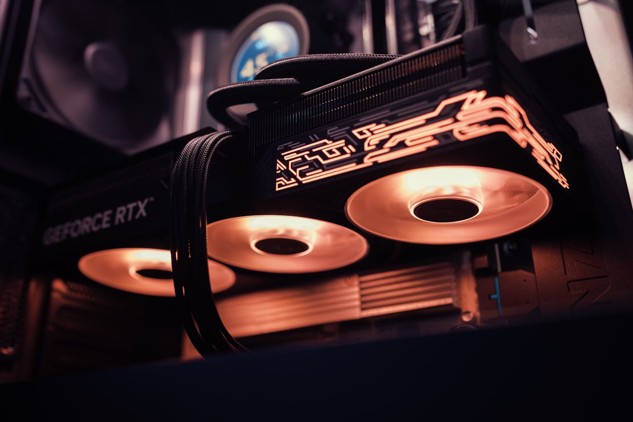 Detailed image of a GeForce RTX GPU with glowing LED lights inside a computer case.